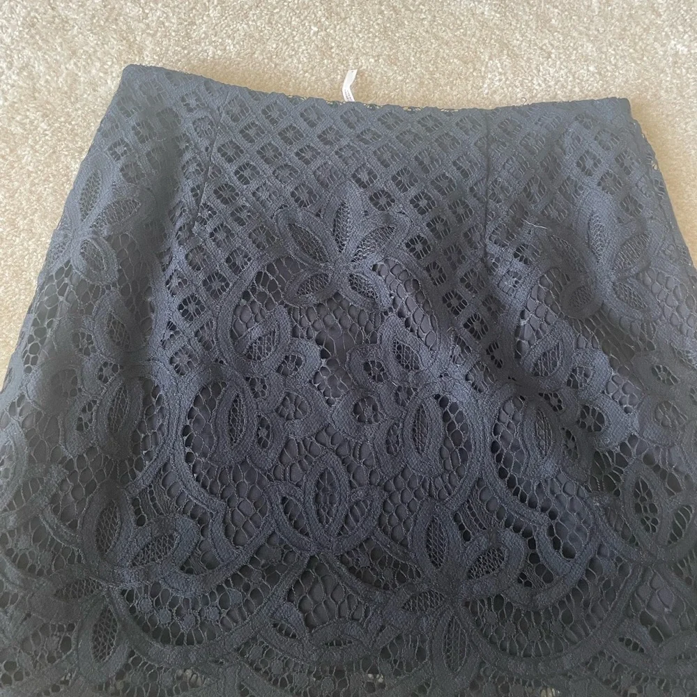 Free People Black Lace mini Skirt. Lined. Side zip.‎ Women size 2.
